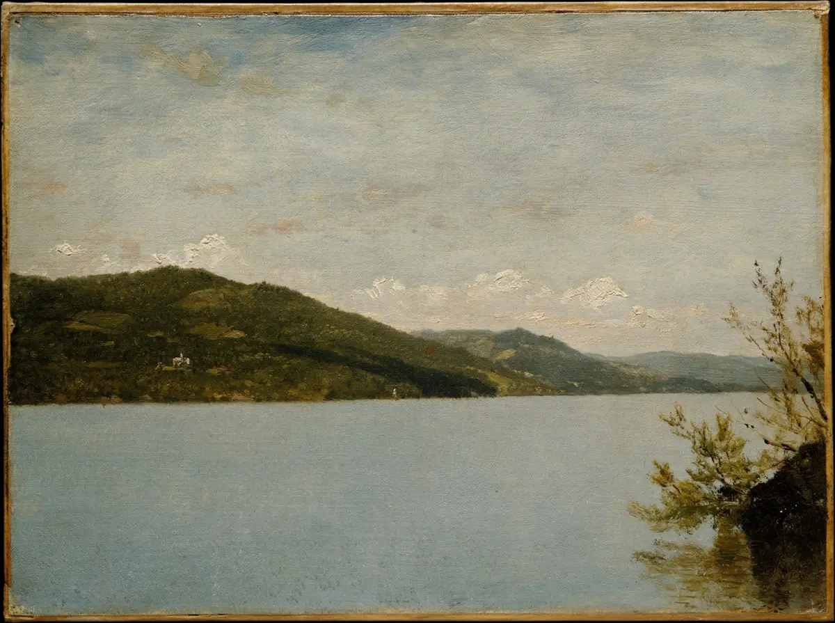 Painting by John Frederick Kensett: a lake of still, clear water stretches to wooded hills, under a pale sky with light clouds; on the right, branches of a shrub over a rock on the shore